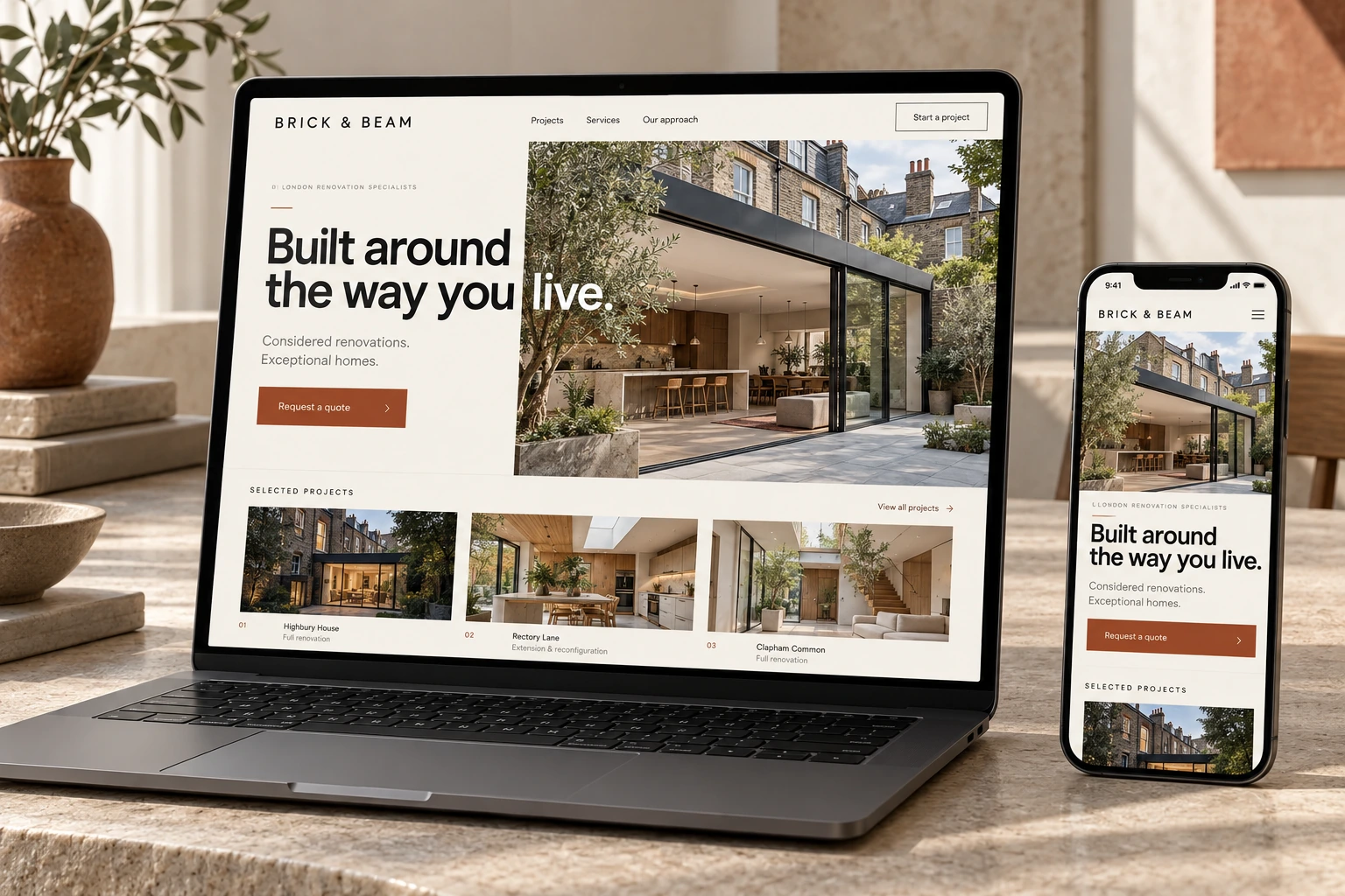 Brick and Beam renovation website mockup displayed on a laptop and phone